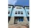 New townhouse exterior showcasing a modern design with large windows and durable WeatherMate Plus house wrap at 479 31St N Way, St Petersburg, FL 33713