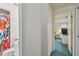 View through doorway toward a bathroom and then to a bedroom at 5001 Queen Palm Ne Ter, St Petersburg, FL 33701