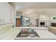 Kitchen sink with stainless steel appliances and view of the backyard at 5001 Queen Palm Ne Ter, St Petersburg, FL 33701