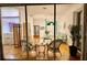 Living room with hardwood floors, ceiling fan, and view of the patio at 5001 Queen Palm Ne Ter, St Petersburg, FL 33703
