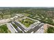 An aerial view shows the community layout, amenities, and convenient location near schools at 5095 Bay Ne St # 210, St Petersburg, FL 33703