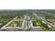 An aerial view displaying a community featuring a pool, mature trees, and convenient parking at 5095 Bay Ne St # 210, St Petersburg, FL 33703