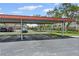 Designated covered parking with reserved signage offers convenience and protection from the elements at 5095 Bay Ne St # 210, St Petersburg, FL 33703