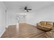 Spacious living room with hardwood floors and modern ceiling fan at 5095 Bay Ne St # 210, St Petersburg, FL 33703