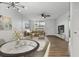 Bright living room with neutral finishes, recessed lights, ceiling fan, modern furniture, and wood-look floors at 5095 Bay Ne St # 210, St Petersburg, FL 33703