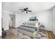 Well-appointed main bedroom with contemporary décor, a ceiling fan, and neutral finishes at 5095 Bay Ne St # 210, St Petersburg, FL 33703