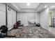 Spacious exercise room featuring neutral walls, drop ceiling and a window at 534 Berkley Ave, Tarpon Springs, FL 34689