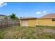 Detached garage in the backyard provides ample storage or parking space, enhancing the property's functionality at 534 Berkley Ave, Tarpon Springs, FL 34689