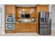 Modern kitchen with granite countertops, stainless steel appliances, and ample storage at 534 Berkley Ave, Tarpon Springs, FL 34689