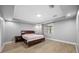 Spacious bedroom featuring neutral walls, wood floors, and a window at 534 Berkley Ave, Tarpon Springs, FL 34689