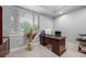 Bright office with neutral walls, tile floor, and a window at 534 Berkley Ave, Tarpon Springs, FL 34689