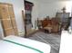 Inviting bedroom with comfortable bed, cozy armchair, and stylish decor, creating a relaxing and welcoming space at 5434 Fairfield S Ave # 1, Gulfport, FL 33707