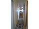 Bright hallway leading to the kitchen, featuring wooden floors and ample natural light for a welcoming atmosphere at 5434 Fairfield S Ave # 1, Gulfport, FL 33707