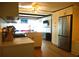 Well-equipped kitchen showcasing modern appliances, custom cabinetry, and a breakfast bar at 5434 Fairfield S Ave # 1, Gulfport, FL 33707