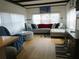Beautiful living room featuring lots of seating, neutral paint, and lots of light at 5434 Fairfield S Ave # 1, Gulfport, FL 33707