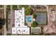 A bird's-eye view of the community amenities including a pool, tennis court, and shuffleboard at 5603 80Th N St # 107, St Petersburg, FL 33709