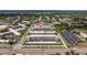 The aerial view shows the condo's convenient covered parking, with well-manicured landscaping at 5603 80Th N St # 107, St Petersburg, FL 33709