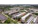 Scenic aerial perspective of condo buildings showcasing the expansive community at 5603 80Th N St # 107, St Petersburg, FL 33709