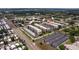 A captivating aerial shot displays the condo community's ample parking and well-maintained landscaping at 5603 80Th N St # 107, St Petersburg, FL 33709