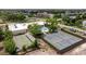 See the amazing amenities including tennis and shuffleboard in this aerial view of the property at 5603 80Th N St # 107, St Petersburg, FL 33709