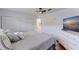 Bedroom features wood floors and ample closet space at 5603 80Th N St # 107, St Petersburg, FL 33709
