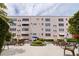 Beautiful courtyard with outdoor seating and lush landscaping at this condo community at 5603 80Th N St # 107, St Petersburg, FL 33709