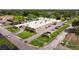 A ground-level view showcases the community center and meticulously maintained landscaping at 5603 80Th N St # 107, St Petersburg, FL 33709