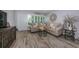 Cozy living room features stylish furniture, neutral tones, and modern decor at 5694 40Th N Ter # 423, Kenneth City, FL 33709