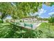 Outdoor shuffleboard courts in a community setting, perfect for leisurely recreation in a charming environment at 5694 40Th N Ter # 423, Kenneth City, FL 33709