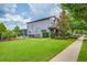 Expansive backyard featuring a well-maintained lawn and a fenced-in pool area, perfect for outdoor enjoyment at 5724 Shell Ridge Dr, Lithia, FL 33547