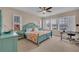Bright bedroom with large windows, cozy decor, and ample space, offering a comfortable personal retreat at 5724 Shell Ridge Dr, Lithia, FL 33547