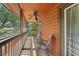 Back porch with wood ceiling and railing at 5817 Myrtle Ln, Tampa, FL 33625