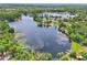 Scenic aerial view of lakefront homes with private docks and stunning water views in a serene setting at 5817 Myrtle Ln, Tampa, FL 33625