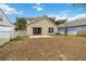 Private backyard with patio, fenced yard, and lush landscaping at 5839 Meadowpark Pl, Lithia, FL 33547
