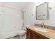 Bathroom featuring tub with shower, granite countertop and vanity at 5839 Meadowpark Pl, Lithia, FL 33547