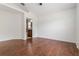 Main bedroom boasts hardwood floors and ensuite bathroom access at 5839 Meadowpark Pl, Lithia, FL 33547