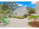 Serene backyard featuring crushed shell, landscaping and inviting patio seating, ideal for relaxing outdoors at 626 16Th Ne Ave, St Petersburg, FL 33704
