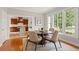 Inviting dining room featuring hardwood floors, lots of light, and seamless access to the updated kitchen at 626 16Th Ne Ave, St Petersburg, FL 33704