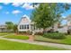 Charming home with manicured lawn and brick walkway leading up to the house at 626 16Th Ne Ave, St Petersburg, FL 33704