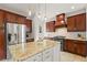 Spacious kitchen with stainless steel appliances, granite countertops, and custom cabinets at 626 16Th Ne Ave, St Petersburg, FL 33704