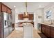 Charming kitchen featuring stainless steel appliances, granite countertops, and ample storage space at 626 16Th Ne Ave, St Petersburg, FL 33704