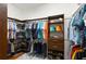 Walk-in closet with custom shelves, ample storage for clothes, shoes, and accessories at 626 16Th Ne Ave, St Petersburg, FL 33704