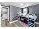Youthful bedroom has gray walls and a bunkbed at 629 Lexington St, Dunedin, FL 34698
