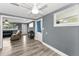 Open-concept area connecting the living room, kitchen, and entryway at 629 Lexington St, Dunedin, FL 34698