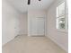 Minimalist bedroom with tile floors, window with plantation shutters and closet at 6820 Muncaster Ct, Tampa, FL 33625