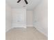 Empty bedroom with double closet doors, tile floor, and clean, bright space at 6820 Muncaster Ct, Tampa, FL 33625