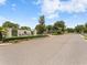 Entrance to Ravinia gated community with lush landscaping and stone signage at 6820 Muncaster Ct, Tampa, FL 33625