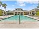 Community pool area with inviting chaise lounges, clear blue water, and well-maintained landscaping at 6820 Muncaster Ct, Tampa, FL 33625
