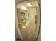 Walk-in closet with custom shelving and ample storage space, providing an organized solution for your wardrobe needs at 6820 Muncaster Ct, Tampa, FL 33625