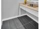 Bathroom showing cabinets with quartz countertop at 714 1St Ct, Palm Harbor, FL 34684